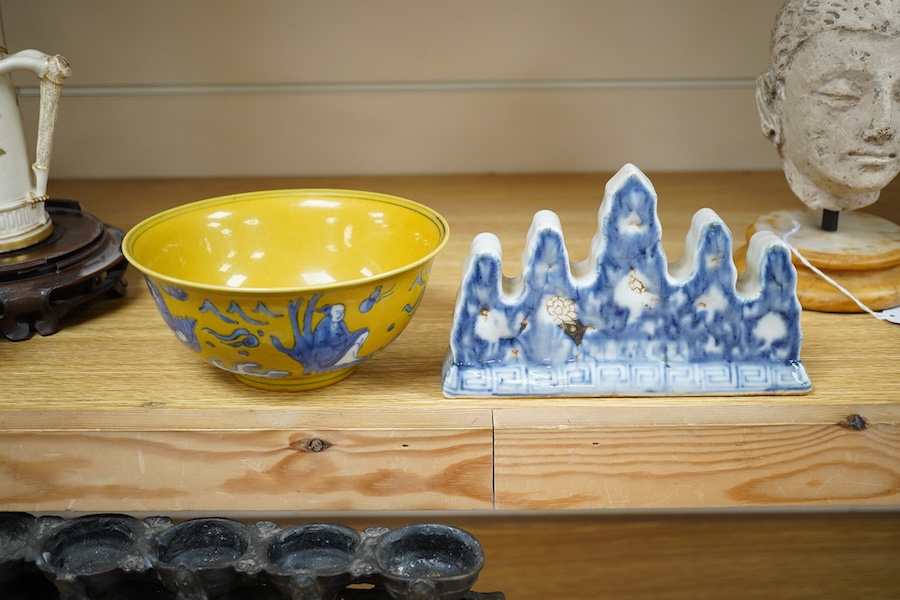 A Chinese blue and white brush holder and a yellow ground bowl, 16cm diameter, Condition - good